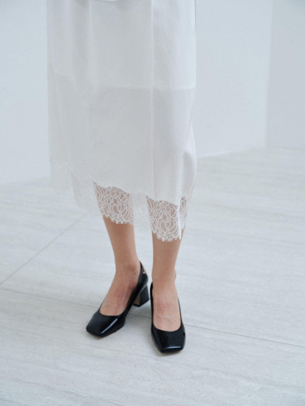 ACETATE LACE DRAPED MIDI SKIRT